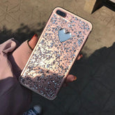 Funda para iPhone 7 con diseño de corazón plateado y copos metálicos transparentes